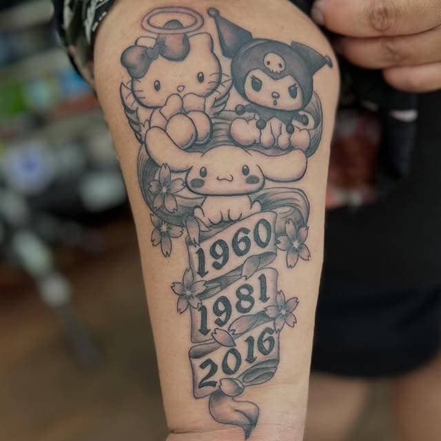 Cartoon character forearm tattoo with dates and floral design.