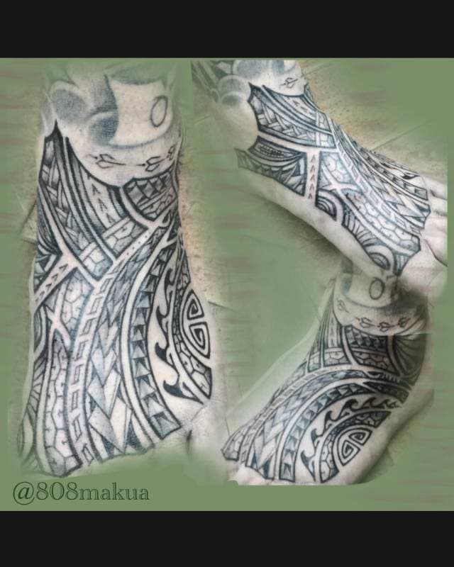 Tribal tattoo on the foot with geometric designs